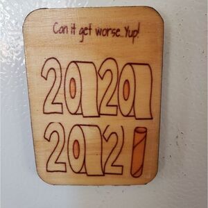 Wood Refrigerator magnet /mini wall hanging. Can it get worse, yep